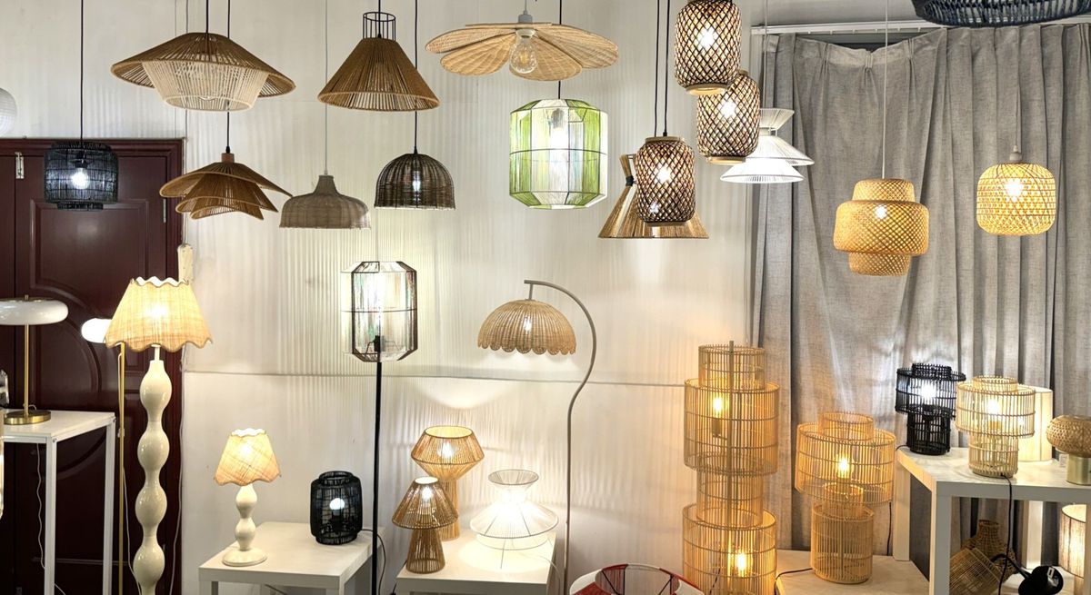 Rattan pendant lights and arc floor lamps display featuring woven bamboo shades and curved modern designs